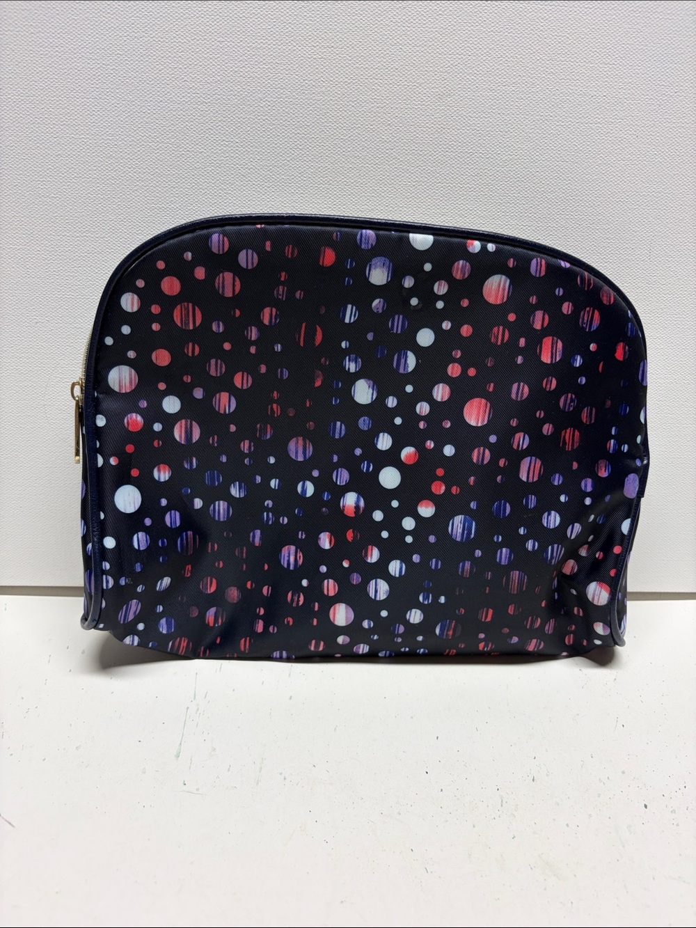 Adrienne Vittadini Navy Cosmetic Bag with Multicolor Dot Pattern